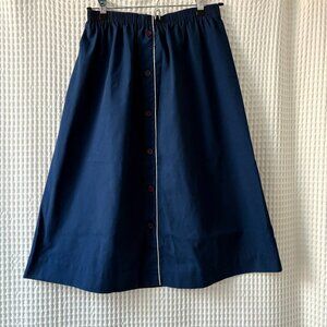 Vintage Take 1 medium 1980s navy blue skirt with white piping faux button front